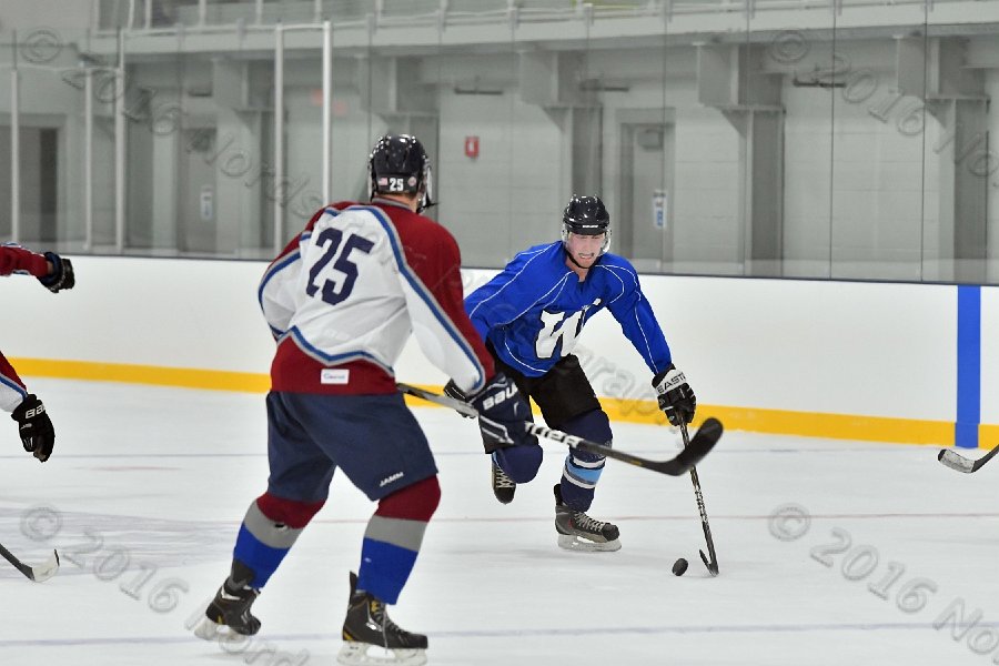 Wheaton College Men\'s Ice Hockey vs Middlesex Community College. - Photo By: KEITH NORDSTROM